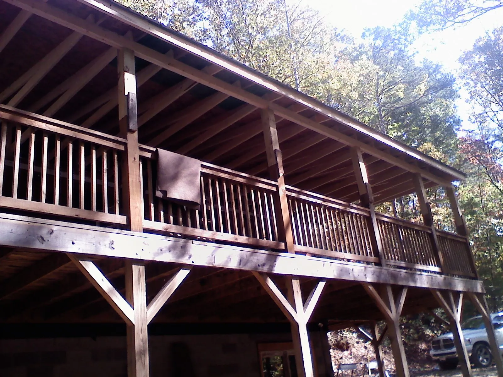 Timber framing under a new elevated porch and deck — Roof Leak Repair in Hartstown by Roofing Brothers